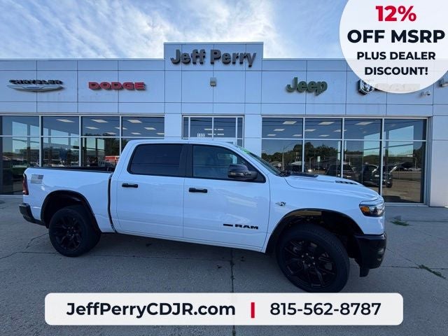 2026 RAM Ram 1500 RAM 1500 LARAMIE CREW CAB 4X4 5'7' BOX in Bright White Clear-Coat Exterior Paint — front three-quarter view