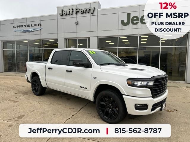 2026 RAM Ram 1500 RAM 1500 LARAMIE CREW CAB 4X4 5'7' BOX in Ivory White Tri-Coat Pearl-Coat Exterior Paint — front three-quarter view