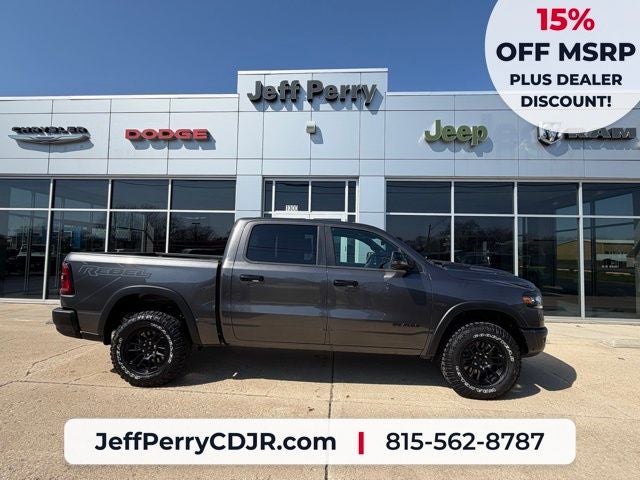 2026 RAM Ram 1500 RAM 1500 REBEL CREW CAB 4X4 5'7' BOX in Granite Crystal Metallic Clear-Coat Exterior Paint — front three-quarter view