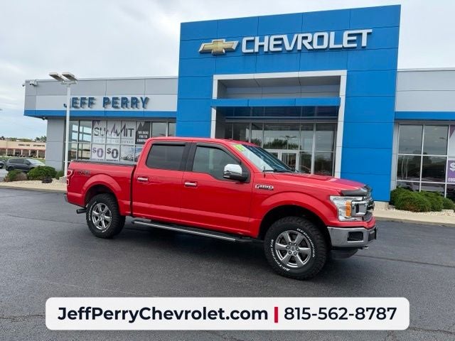 2018 Ford F-150 XLT in Race Red — front three-quarter view