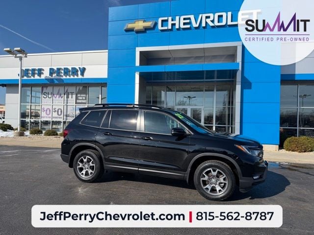 2023 Honda Passport AWD TrailSport in Crystal Black Pearl — front three-quarter view
